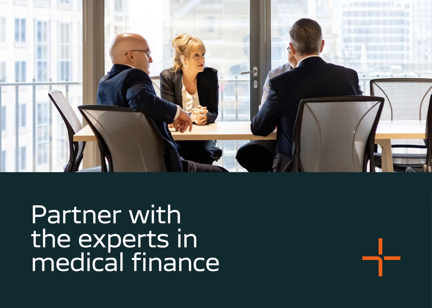 Medpro Finance team sitting in a meeting room